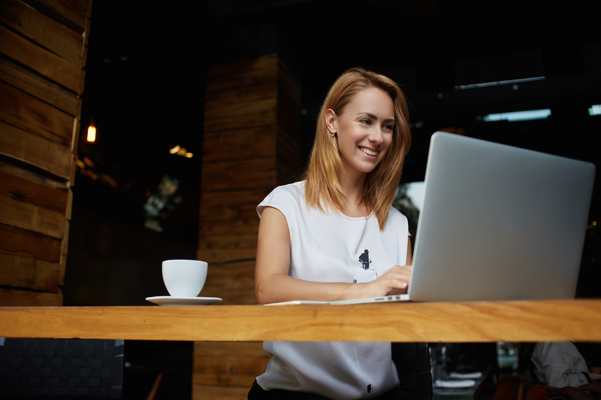 Woman looking at laptop